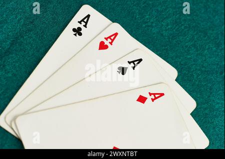 Poker of aces on black background Stock Photo