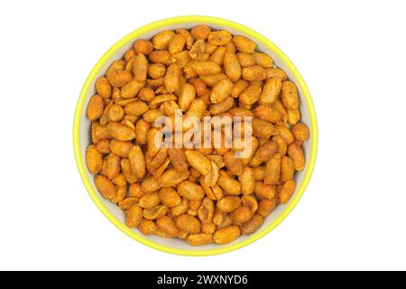 Bowl full of chilli flavour coated peanuts isolated on white background Stock Photo