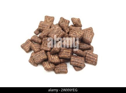 Pile of chocolate cereals pads shaped flakes isolated on white background Stock Photo