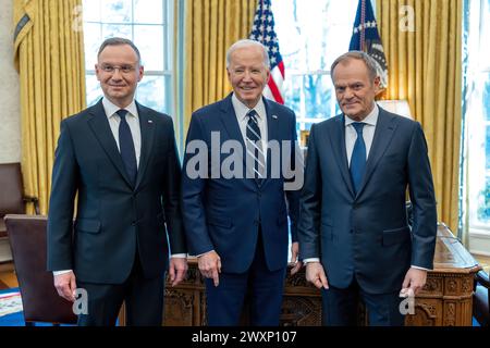 President. Joe Biden greets President Andrzej Duda and Prime Minister Donald Tusk of Poland, Tuesday, March 12, 2024, in the Oval Office. (Official White House Photo by Adam Schultz) Stock Photo