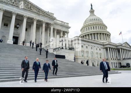 President Joe Biden bids farewell to Taoiseach Leo Varadkar and House Speaker Mike Johnson (R-LA) as he departs the U.S. Capitol after the Friends of Ireland Luncheon, Friday, March 15, 2024, in Washington, D.C. (Official White House Photo by Adam Schultz) Stock Photo