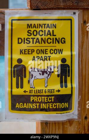 Sign in rural Montana reminding people to social distance and keep 6 feet apart during the COVI 19 pandemic Stock Photo