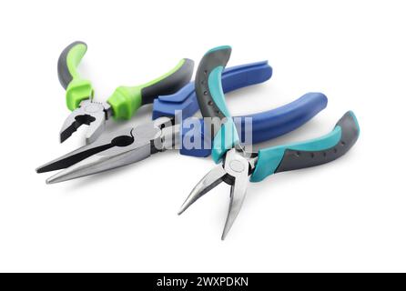 Different pliers isolated on white. Construction tool Stock Photo