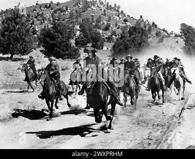 Max Baer (center), on-set of the film, 'Buckskin Frontier', United Artists, 1943 Stock Photo