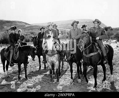 Audie Murphy, George Tobias, Ruta Lee, Edward Platt, Alan Hale, Jr., on-set of the film, 'Bullet For A Badman', Universal Pictures, 1964 Stock Photo