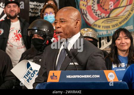 Mayor Eric Adams speaks as he announced increase minimum pay rate for ...