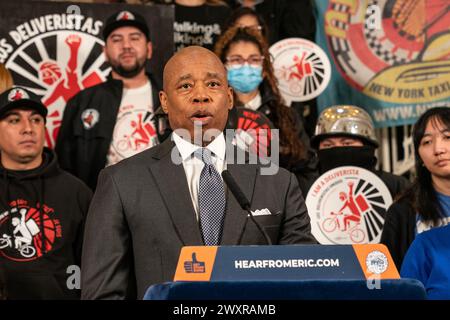 Mayor Eric Adams speaks as he announced increase minimum pay rate for ...