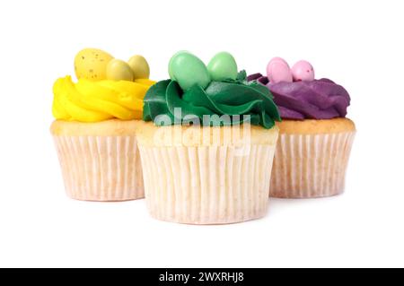 Tasty decorated Easter cupcakes isolated on white Stock Photo