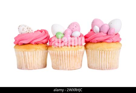 Tasty decorated Easter cupcakes isolated on white Stock Photo