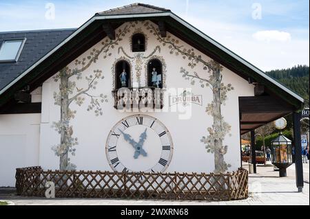 Cuckoo clocks at the Drubba store in the Black Forest, Lake Titisee Neustadt in Germany, traditional craft, vintage wood carving, 30.03.2024 Stock Photo