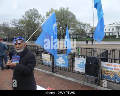 The White House, 1600 Pennsylvania Ave, Washington DC 20500, April 1, 2024. Lone Demonstrator at The White House Ellipse Reminds Passers-By of the Plight of China's Uyghur Minority. Credit: Julia Mineeva/EGBN News/Alamy Live News Stock Photo