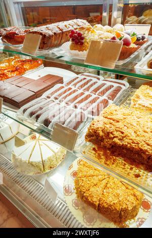 Delectable Assortment of Pastries and Sweets on Display at a Bakery Shop Stock Photo