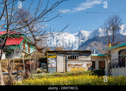 Outbuildings in Naddi village, famous for Naddi View Point with spectacular views of the picturesque massive Himalayan Dhauladhar Range Stock Photo