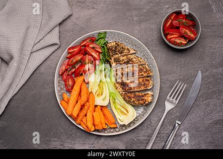 Food photography of roasted chicken, fillet, bok choy, tomato,  fried sweet potatoes, sliced, close up, cook, cooked, cooking, cuisine, delicious, die Stock Photo