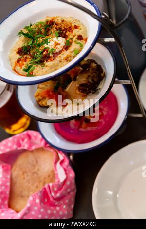 Different types of meze dishes served on table Stock Photo
