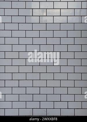 Texture of white ceramic tiles in the form of wall bricks Stock Photo