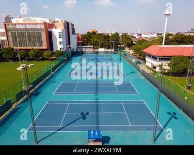 Bangkok, Thailand - December 15, 2023: Aerial view of International School Bangkok tennis court located in Bangkok, Thailand. Stock Photo