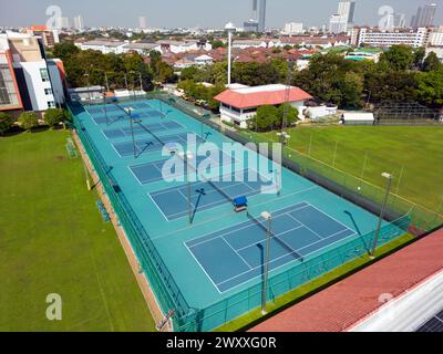 Bangkok, Thailand - December 15, 2023: Aerial view of International School Bangkok tennis court located in Bangkok, Thailand. Stock Photo