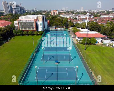 Bangkok, Thailand - December 15, 2023: Aerial view of International School Bangkok tennis court located in Bangkok, Thailand. Stock Photo