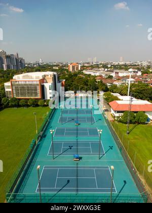 Bangkok, Thailand - December 15, 2023: Aerial view of International School Bangkok tennis court located in Bangkok, Thailand. Stock Photo