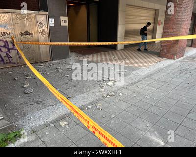 Taipei. 3rd Apr, 2024. This photo taken on April 3, 2024 shows fallen tiles of a damaged building in Taipei, southeast China's Taiwan. A 7.3-magnitude earthquake jolted the sea area near Hualien of China's Taiwan at 7:58 a.m. Wednesday (Beijing Time), according to the China Earthquake Networks Center (CENC). The epicenter was monitored at 23.81 degrees north latitude and 121.74 degrees east longitude, at a depth of 12 km, said a report issued by the CENC. Credit: Qi Fei/Xinhua/Alamy Live News Stock Photo