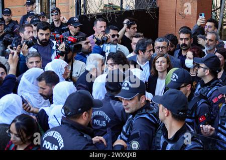 A group of Kurdish peace mothers take part during the protest as police officers block the way in front of the Provincial Election Board. The decision of the Ministry of Justice to cancel the right to be elected Metropolitan Mayor candidate of the People's Equality and Democracy Party, Abdullah Zeydan, who won the local elections in Van, was protested by the Kurdish political parties. Executives and deputies of the People's Equality and Democracy Party (DEM Party) and the Democratic Regions Party (DBP) attended the protest in front of the Provincial Election Board building in Diyarbak?r. Hundr Stock Photo