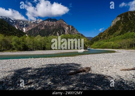 River Azusa and snowy Mount Hotaka in the Hida mountain range Stock Photo