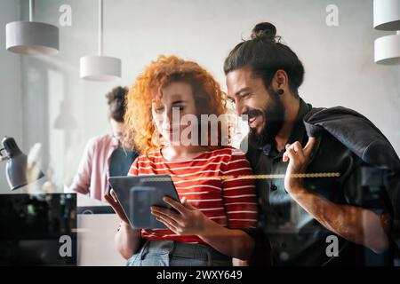 Software, coding and business woman on tablet thinking of data analytics, digital technology. Stock Photo