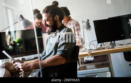 Software, coding and business woman on tablet thinking of data analytics, digital technology. Stock Photo