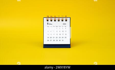 a desk calendar for May 2024 year on a yellow background. banner. space for text Stock Photo