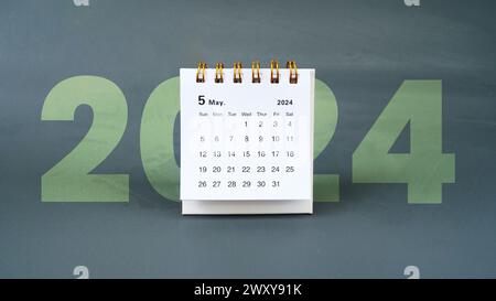 a desk calendar for May 2024 year on a yellow background. banner. space for text Stock Photo