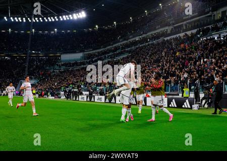 Federico Chiesa of Juventus FC celebrates with teammates after scoring during the Coppa Italia match between Juventus FC and SS Lazio  at Allianz Stad Stock Photo