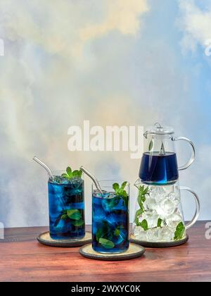 Iced blue tea made from Anchan flowers also known as butterfly pea (Clitoria ternatea), top copy space Stock Photo