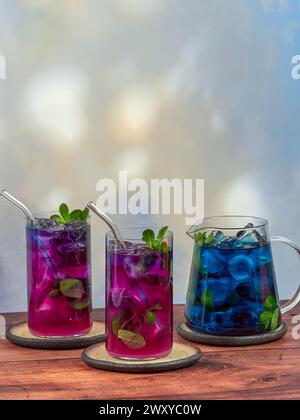 Iced blue tea made from Anchan flowers also known as butterfly pea (Clitoria ternatea), top copy space Stock Photo