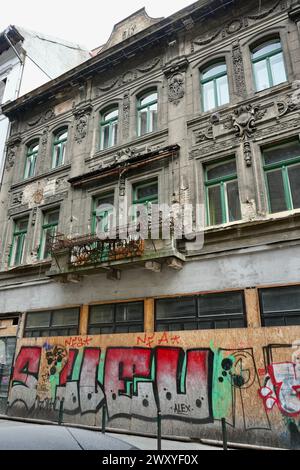 Vintage buildings with graffiti in The Jewish Quarter. Stock Photo