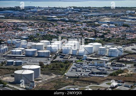 La Rochelle (central-western France): aerial view of storage tanks of La Pallice and houses with the sea in the background. SEVESO-classified site. Co Stock Photo