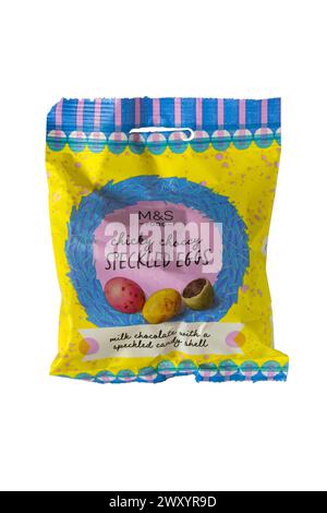 Packet of chicky choccy speckled eggs from M&S isolated on white background - milk chocolate with a speckled candy shell for Easter Stock Photo