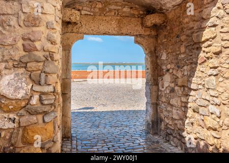 Porta Nova arch, one of historical gate in old town at Faro. Algarve, Portugal Stock Photo