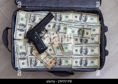 Open suitcase with one million dollars bills stacks Stock Photo