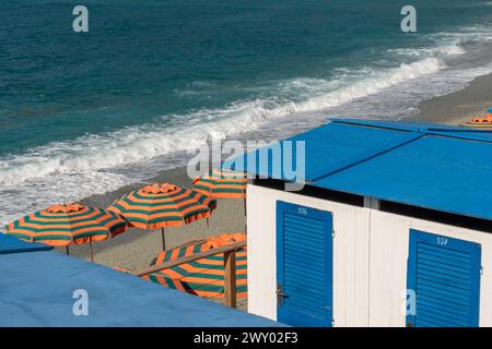 High angle view of colorful beach cabins and umbrellas against sea Stock Photo