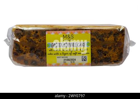 Easter Simnel Cake from M&S isolated on white background - all butter delicately spiced fruit cake with a layer of soft marzipan Stock Photo