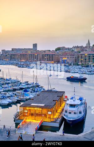 The Old Port (Vieux Port) of Marseille at dusk. The city center of  Marseille, Provence-Alpes-Cote d'Azur. France Stock Photo