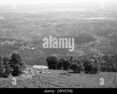 Landscape from Foia to the city of Portimao and the sea. The highest mountain in the Algarve with views of mountains and valleys down to the sea. Stock Photo