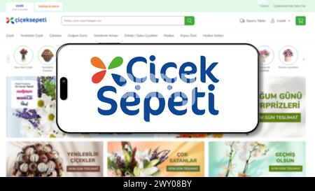 Istanbul, Turkey - 27 March 2024: Ciceksepeti logo on smartphone screen with its website in background. Cicek Sepeti is an online flower and gift deli Stock Photo