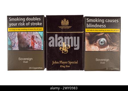 jps cigarettes old packaging An original empty packet of 20 John Player Special (JPS) cigarettes from  approx 1990 beside modern packets with health warnings Stock Photo