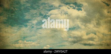 Blue cloudy sky background in vintage style. Stock Photo