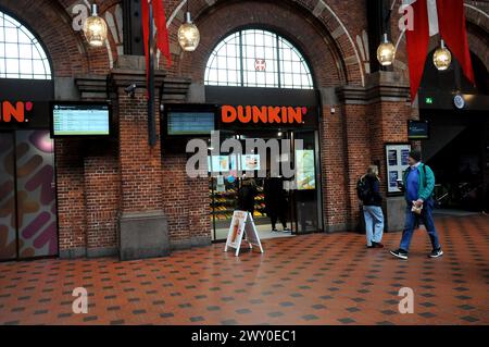 Copenhagen/ Denmark/03 April 2024/Shoppers and people walk by and buy at dunkin cafe inCopenhagen.    (Photo.Francis Joseph Dean/Dean Pictures) Stock Photo