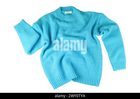 Turquoise flying crumpled women's autumn knitted sweater isolated on white background. Creative clothing concept, trendy fall winter cozy creasy jerse Stock Photo