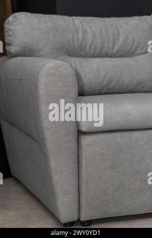 Grey sofa against brick wall in the room Stock Photo Alamy