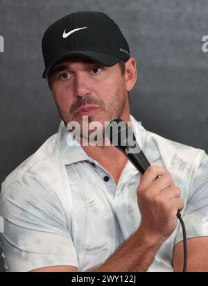 Captain Brooks Koepka of Smash GC smiles on the practice area during